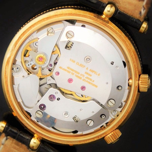 Van Cleef & Arpels The World Time Alarm “TRAVELER” In 18K Solid
